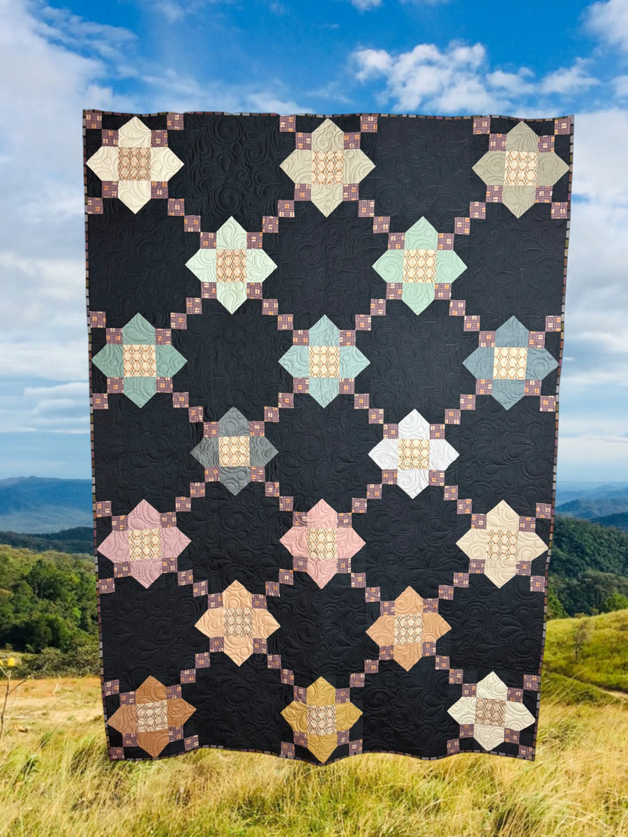Posy Chain quilt, edge-to-edge longarm quilted by Third Story Threads