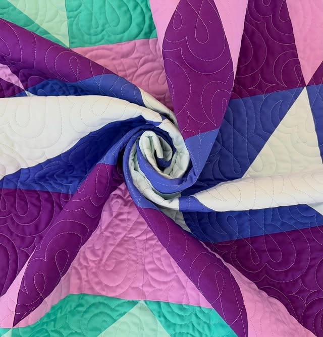 A finished longarm quilt by Bethany at Third Story Threads