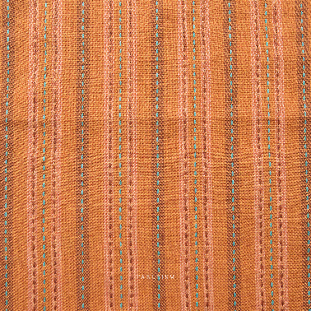 Canyon Springs - Stitch Stripe Rust - sold by the half yard