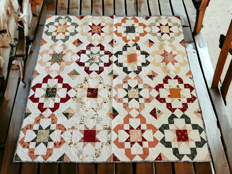 Star-block sampler quilt, longarm quilted